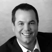 Professional black and white headshot of Dave Buffenbarger